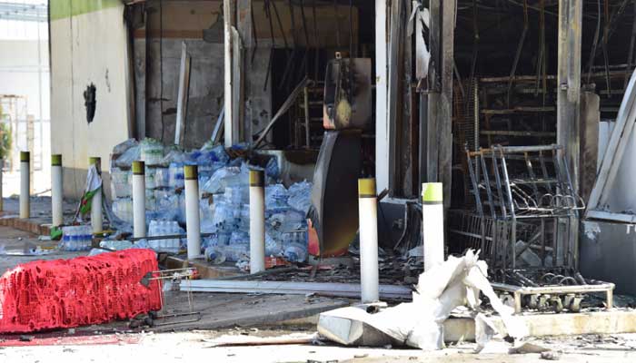 This picture shows a convenience stores damaged after an attack, in Cho-airong district in southern Thailand´s Narathiwat province, on August 17, 2022. AFP