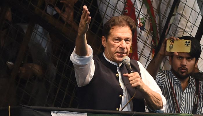 Pakistan´s former Prime Minister and Pakistan Tehreek-e-Insaf party (PTI) chief Imran Khan, delivers a speech to his supporters during a rally celebrate the 75th anniversary of Pakistan´s independence day in Lahore on August 13, 2022. — AFP/File