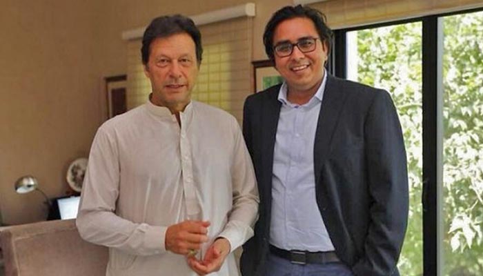 PTI chief Imran Khan (L) and his chief of staff Shahbaz Gill. — AFP/File