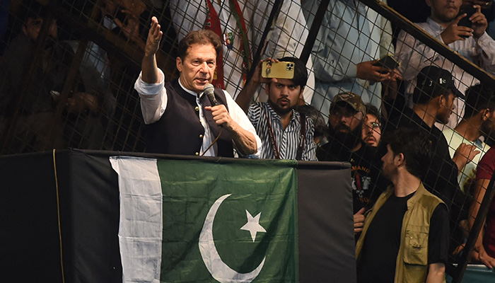 Pakistans former prime minister and PTI chief Imran Khan delivers a speech to his supporters during a rally to celebrate the 75th anniversary of Pakistans Independence Day in Lahore on August 13, 2022. — AFP