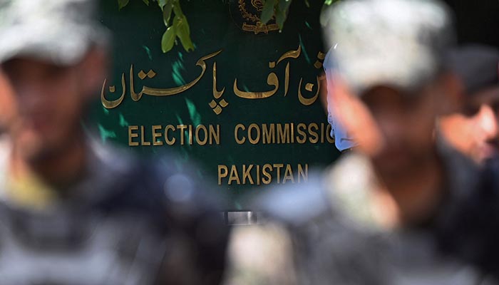 Paramilitary soldiers stand guard outside the Pakistans election commission building in Islamabad. — AFP/File