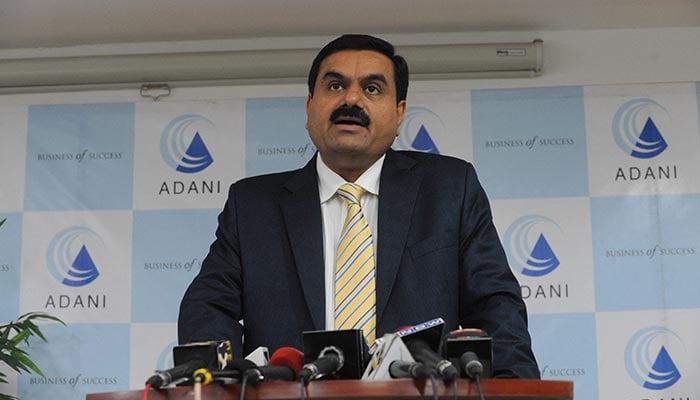In this file photo taken on December 23, 2010, Chairman of the Adani Group Gautam Adani speaks during a press conference in Ahmedabad. An Indian billionaire close to Prime Minister Narendra Modi is trying to buy a broadcaster seen as the last major critical voice on television, stoking fears about media freedom in the world´s largest democracy. — AFP