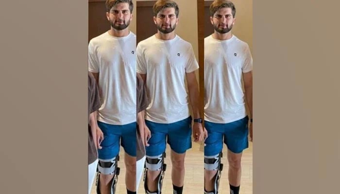 Shaheen Shah Afridi is seen wearing a knee brace in this photograph. — Twitter/@muzamilasif4