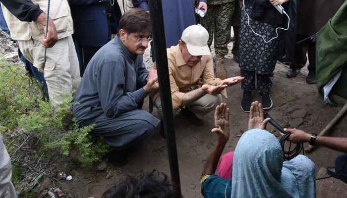 Prime Minister Shahbaz Sharif along with Sindh CM Murad Ali Shah visits flood victims in the province. Photo: PM Office
