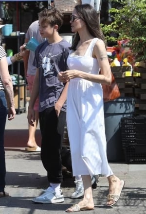 Angelina Jolie looks radiant in white as she takes to streets in L.A with son Knox