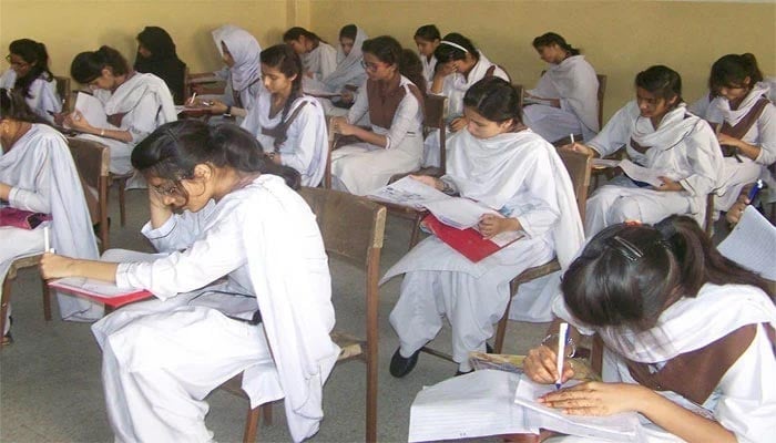 Female students at an examination centre. — File