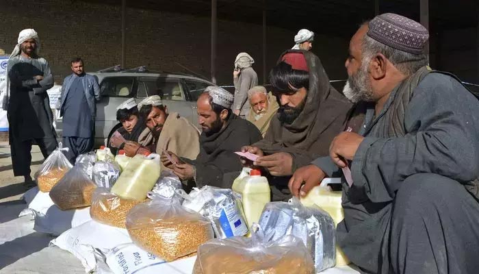 Food packets are being distributed among Afghan families by the World Food Programme (WFP) in Kandahar on December 23.