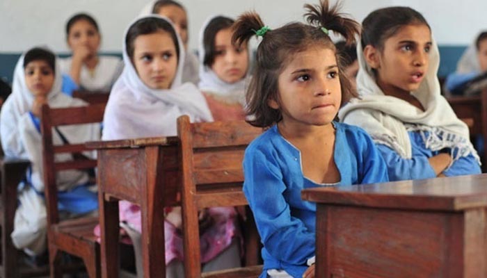 Young girls seated in a classroom. — AFP/File