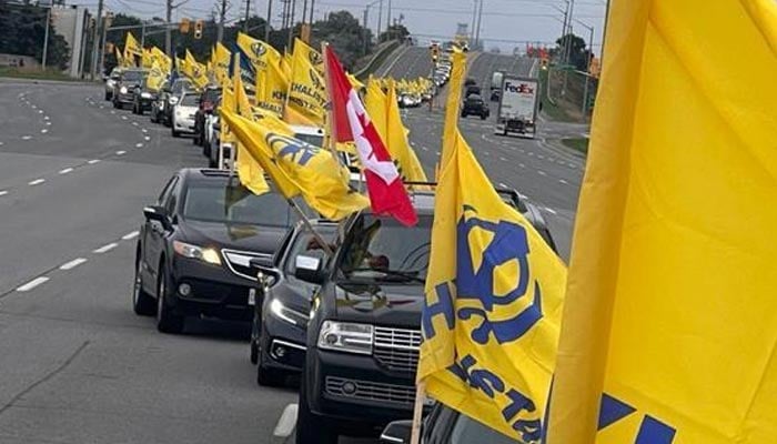A long trail of cars drive during a rally in support of the Khalistan movement. — Photo by reporter