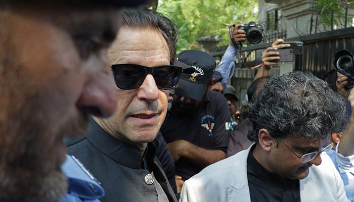 Former Pakistan´s prime minister Imran Khan (C) arrives in a court for a case hearing in Islamabad on September 8, 2022. — AFP/File