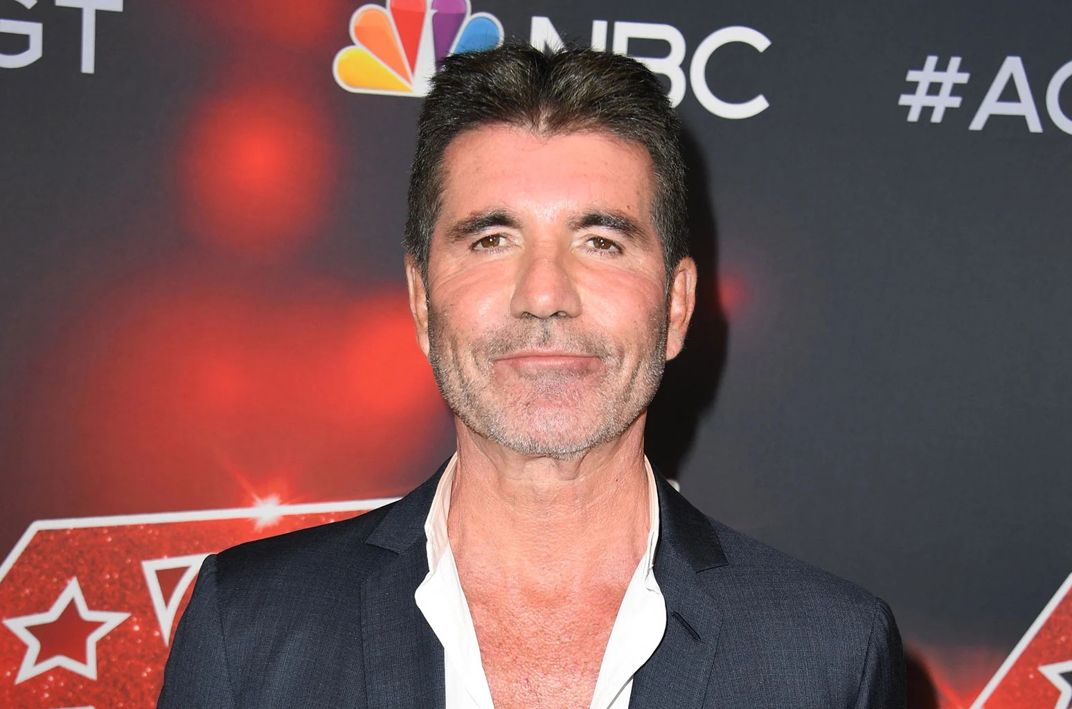 simon-cowell-shows-support-for-harry-styles-after-spitgate-incident