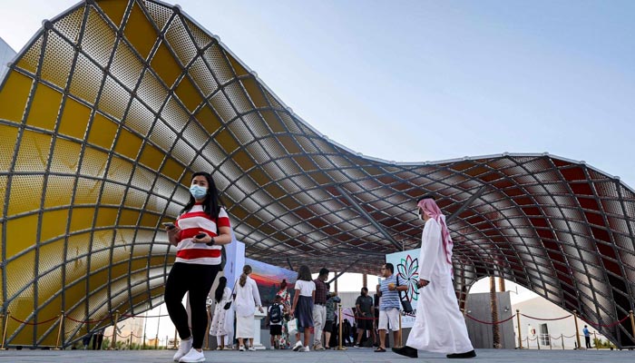 Visitors walk outside the Iraqis pavilion in Expo 2020 which took place in Dubai, UAE. — AFP/File