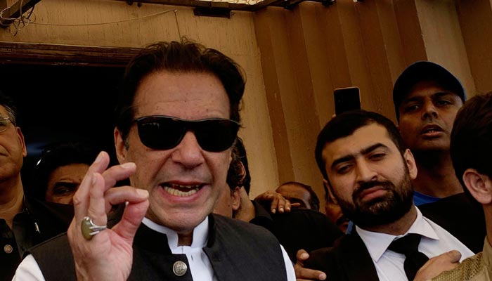 Former Prime Minister of Pakistan Imran Khan speaks to the media after appearing before an anti-terrorism court in Islamabad on September 12, 2022.  - AFP