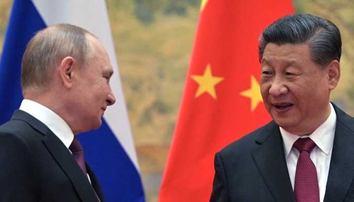 Russian President Vladimir Putin (L) and Chinese President Xi Jinping (R) met in Beijing. Photo: AFP/file