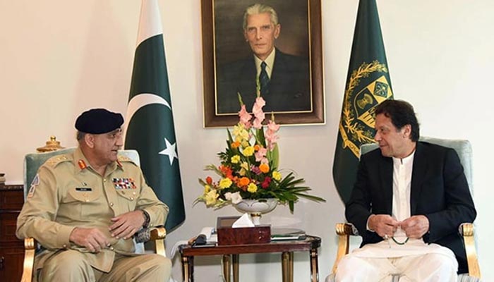 In this file photo the Chief of Army Staff General Qamar Javed Bajwa meets Prime Minister Imran Khan at the Prime Minister House. — PID/File