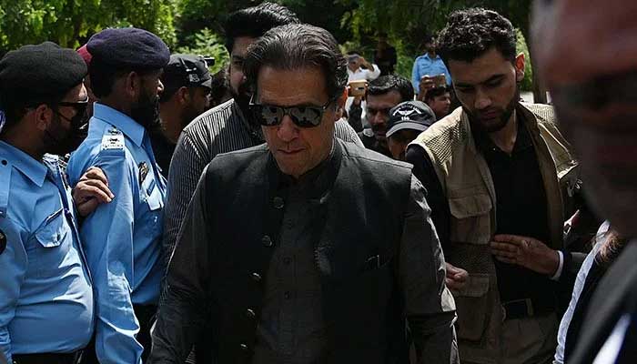 Former Pakistani prime minister Imran Khan (C) arrives to appear before the Anti-Terrorism Court in Islamabad on September 1, 2022. — AFP/File