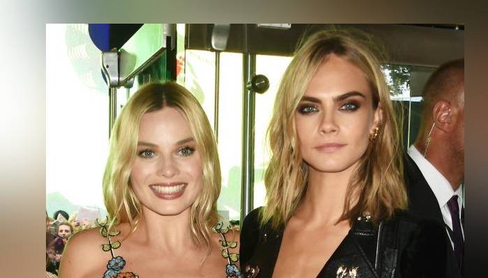 Margot Robbie appears distraught after leaving Cara Delevingne’s house amid health concern