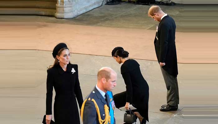 Prince Harry and Meghan Markle accused of stealing spotlight at Queens funeral