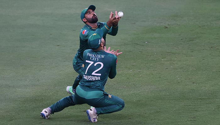 Pakistan´s Khushdil Shah (#72) collides with his teammate Fakhar Zaman before taking a catch to dismiss India´s captain Rohit Sharma (not pictured) during the Asia Cup Twenty20 international cricket Super Four match between India and Pakistan at the Dubai International Cricket Stadium in Dubai on September 4, 2022. — AFP/File