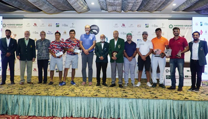 Golfers and awardees stand alongside distinguished guests following the Hashoo Group World Corporate Golf Challenge (WCGC) Pakistan in Lahore. — Photo by WCGC