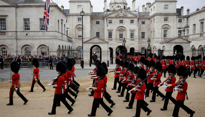 Coldstream Guards march ahead of the State Funeral of Queen Elizabeth-AFP