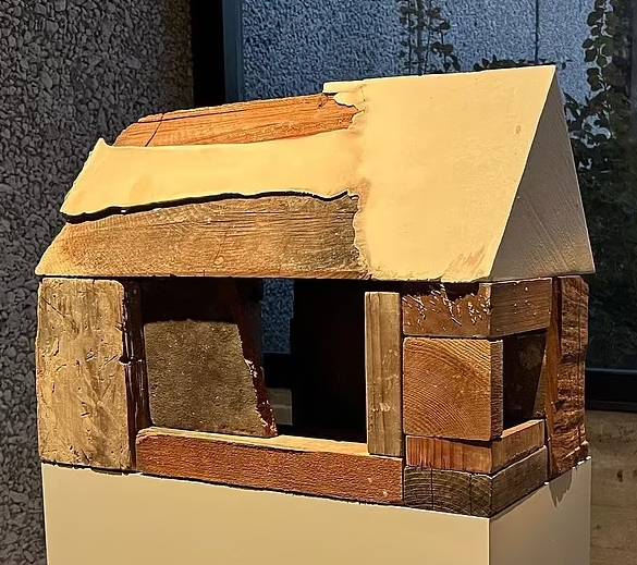 Miniature house-shaped structure