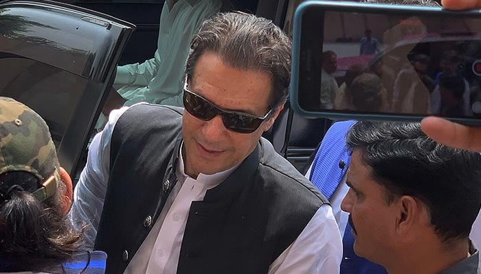 Pakistan´s former prime minister Imran Khan (C) arrives to appear before the Anti-Terrorism Court in Islamabad on September 12, 2022. — AFP/File