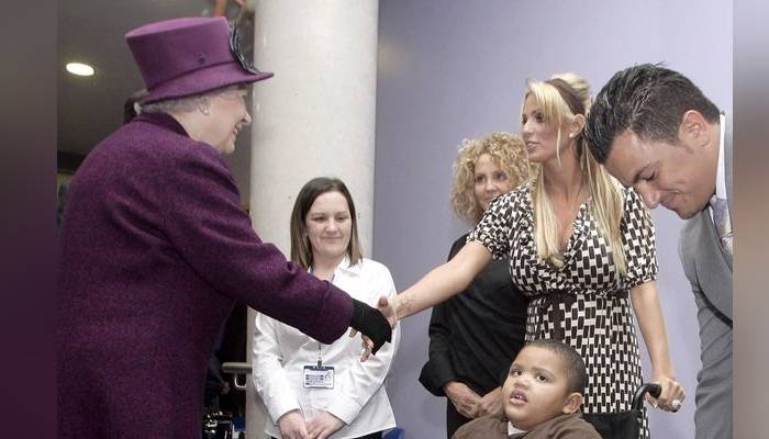 Katie Price reveals rare photo of her with late Queen Elizabeth II in a candid moment