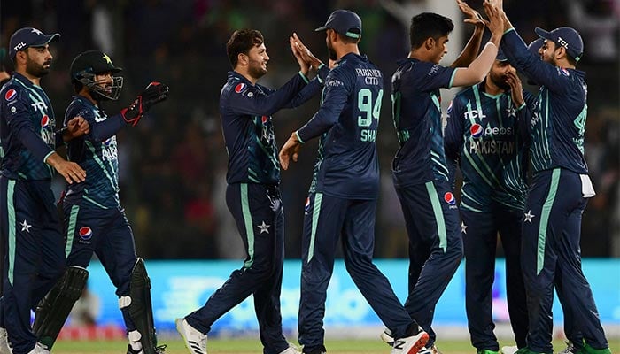 Pakistans cricketers celebrate after the dismissal of Englands Dawid Malan (not pictured) during the third Twenty20 international cricket match between Pakistan and England at the National Cricket Stadium in Karachi on September 23, 2022. — AFP/File
