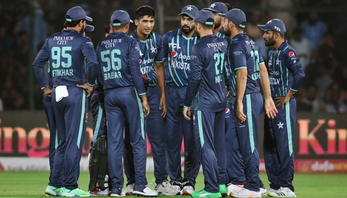Team Pakistan gather around Mohammad Hasnain after he took a wicket of an English batter. — Twitter/Shadab Khan/@76Shadabkhan