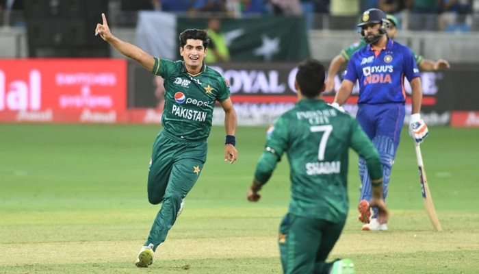 Pakistan pacer Naseem Shah celebrates after taking the wicket of an Indian batter during an Asia Cup 2022 match.