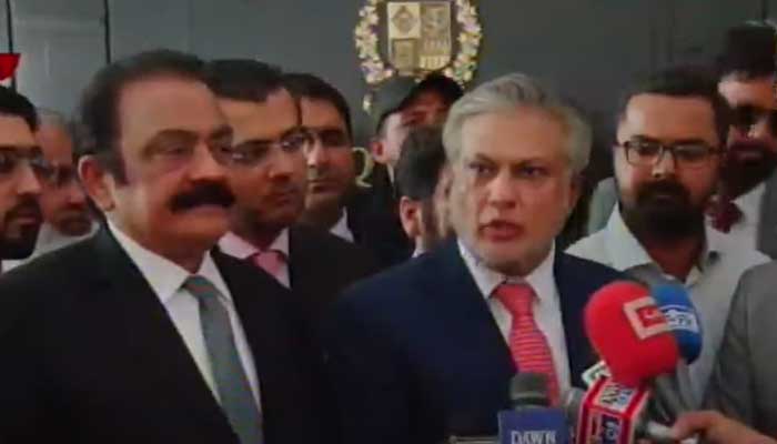 Federal Minister Ishaq Dar is talking to journalists upon arrival at the Finance Ministry. — Screengrab iva YouTube/ Geo News Live