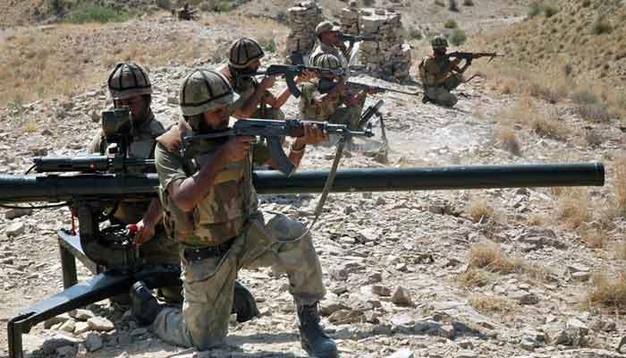 Pakistan Army soldiers take positions during a training session. — AFP/File