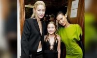 Harper Beckham joins Gigi and Bella Hadid during Paris Fashion Week