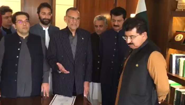 PTI leaders file Toshakhana reference against PPP’s former prime minister Yousaf Raza Gillani before Senate Chairman Sadiq Sanjrani. Photo Twitter/@nausheenyusuf
