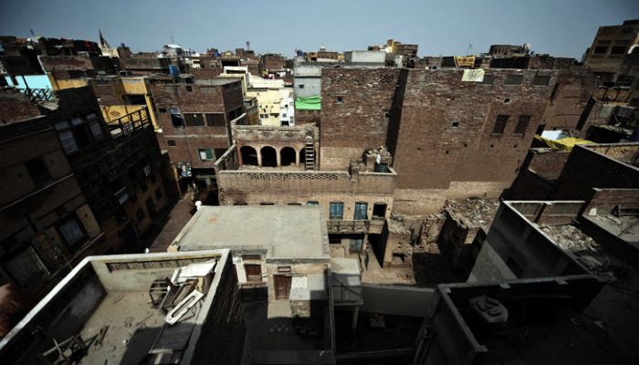 Dilapidated buildings and residences are pictured in the old town section of Multan. - AFP