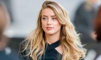 Amber Heard Attracts Criticism With Spain Trip 