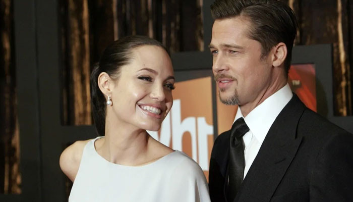 Angelina Jolie says drunk Brad Pitt splashed 'red wine' at one of her kids