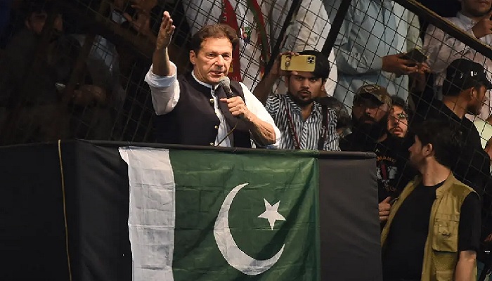 PTI Chairman Imran Khan addressing a rally in Lahore. — AFP/ File
