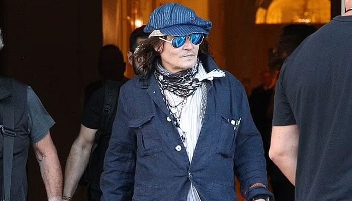Johnny Depp cuts dapper figure ahead of Jeff Beck concert