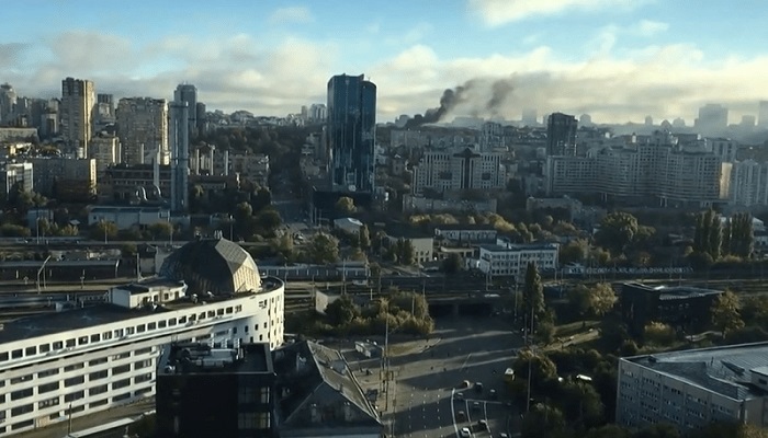 This video grab taken and released on October 10, 2022 from a UGC footage shows smoke rising from Kyiv skyline after several Russian strikes hit the Ukrainian capital, with police reporting a number of fatalities. — AFP