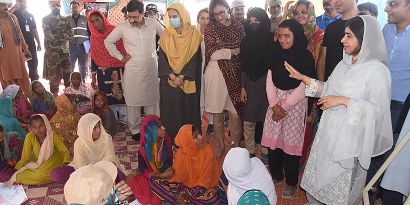DADU: Nobel Peace Laureate Malala Yousufzai takes a class in a girls primary school established in a tent at Tent City at the MNV Drain embankment. — CM House