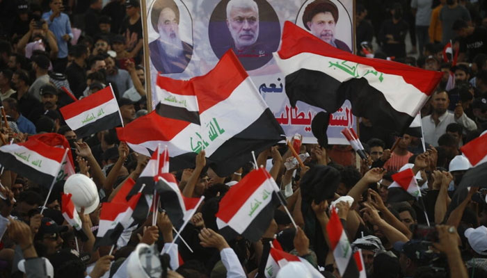 Supporters of Iraqs Coordination Framework rally in the Green Zone Ahmad Al-rubaye. — AFP/File