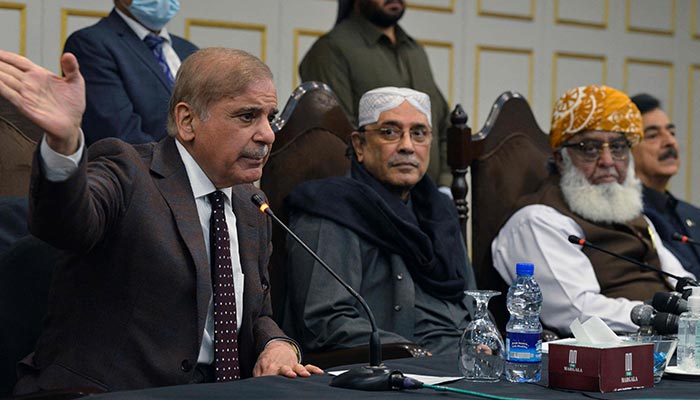 (Left to right) Prime Minister Shahbaz Sharif, PPP Co-chairman Asif Ali Zardari (C), and JUI-F chief Maulana Fazlur Rehman hold a press conference in Islamabad, on March 8, 2022. — AFP
