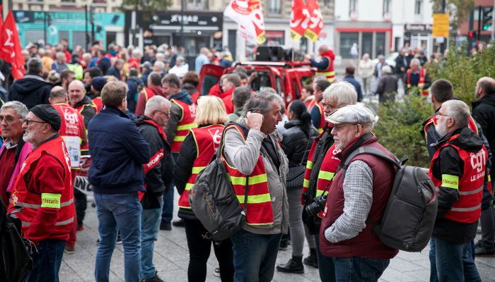 Protestors wearing CGT vests gather to attend a demonstration in Le Havre, northwestern France, on October 18, 2022 after the CGT and FO trade unions called for a nationwide strike for higher salaries.— AFP