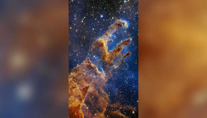 NASA tarafından 19 Ekim 2022'de sağlanan bu bilgi notu fotoğrafı, NASA'nın James Webb Uzay Teleskoplarının yakın kızılötesi ışık görünümünde renkli bir kaleydoskopta ayarlanmış Yaratılış Sütunlarını gösteriyor.  — AFP/Dosya