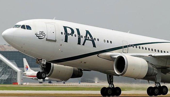 An aeroplane of the national flag carrier of Pakistan is seen in this file photo. — AFP