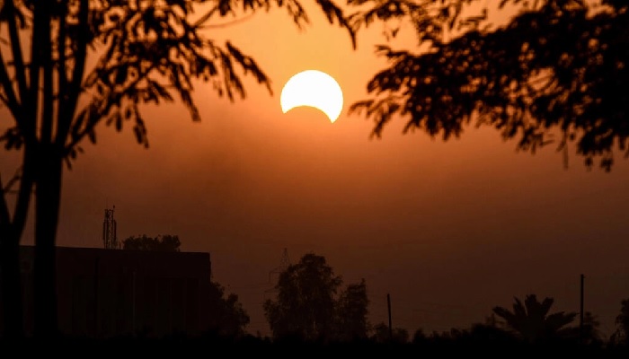 A partial solar eclipse in 2019. Tuesdays eclipse is not expected to darken the sky. — AFP