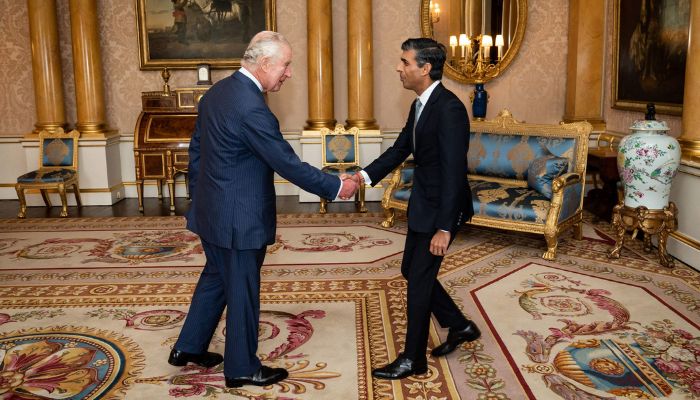 Britain´s King Charles III greets newly appointed Conservative Party leader and incoming prime minister Rishi Sunak during an audience at Buckingham Palace in London on October 25, 2022, where Sunak was invited to form a government.— AFP