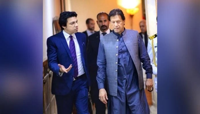 Former federal minister Faisal Vawda (left) speaks with PTI Chairman Imran Khan in this undated photo. — Twitter/@faisalvawdapti